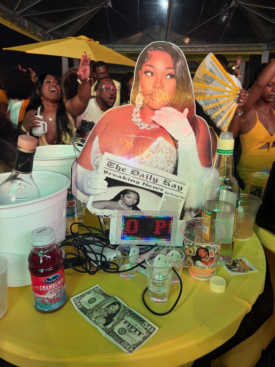 Custom big head LED prop displayed at party