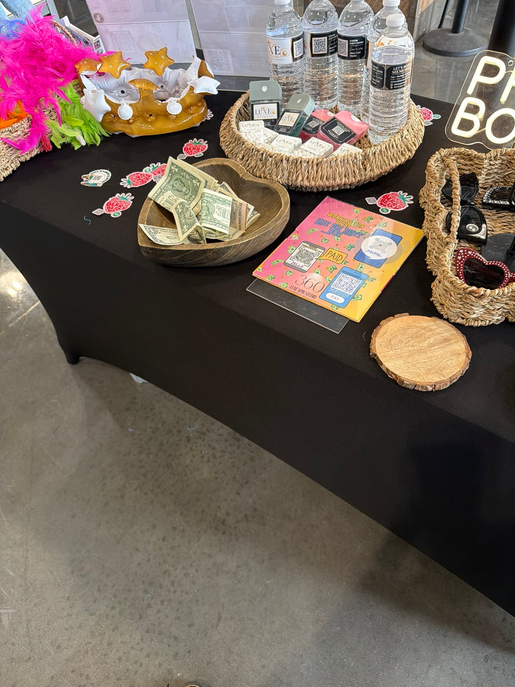 Custom Tic Tac favors displayed at a Luxe Spin Studio event table
