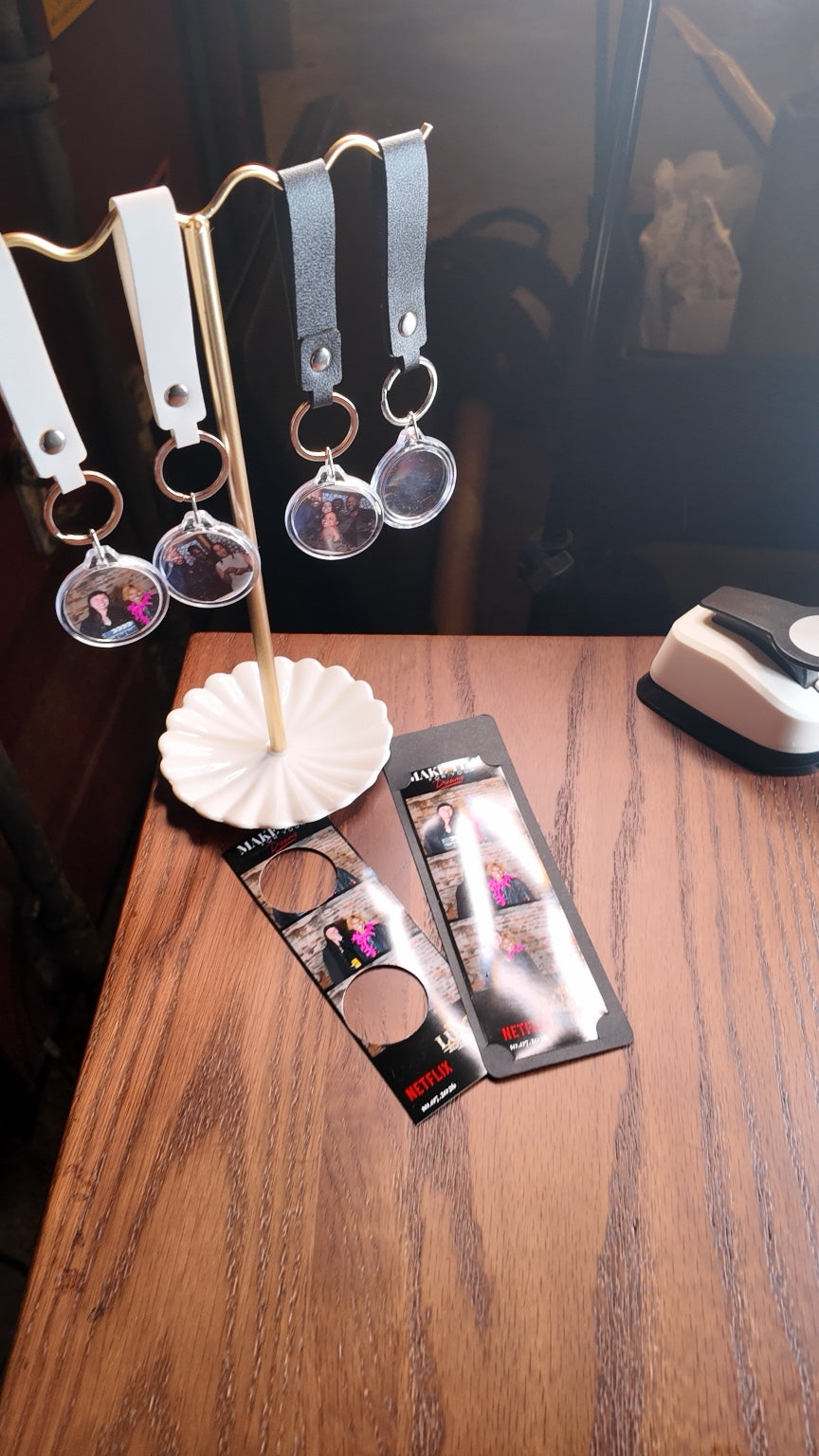 Photo keychain display with printed photo strips at Bushwick Film Festival