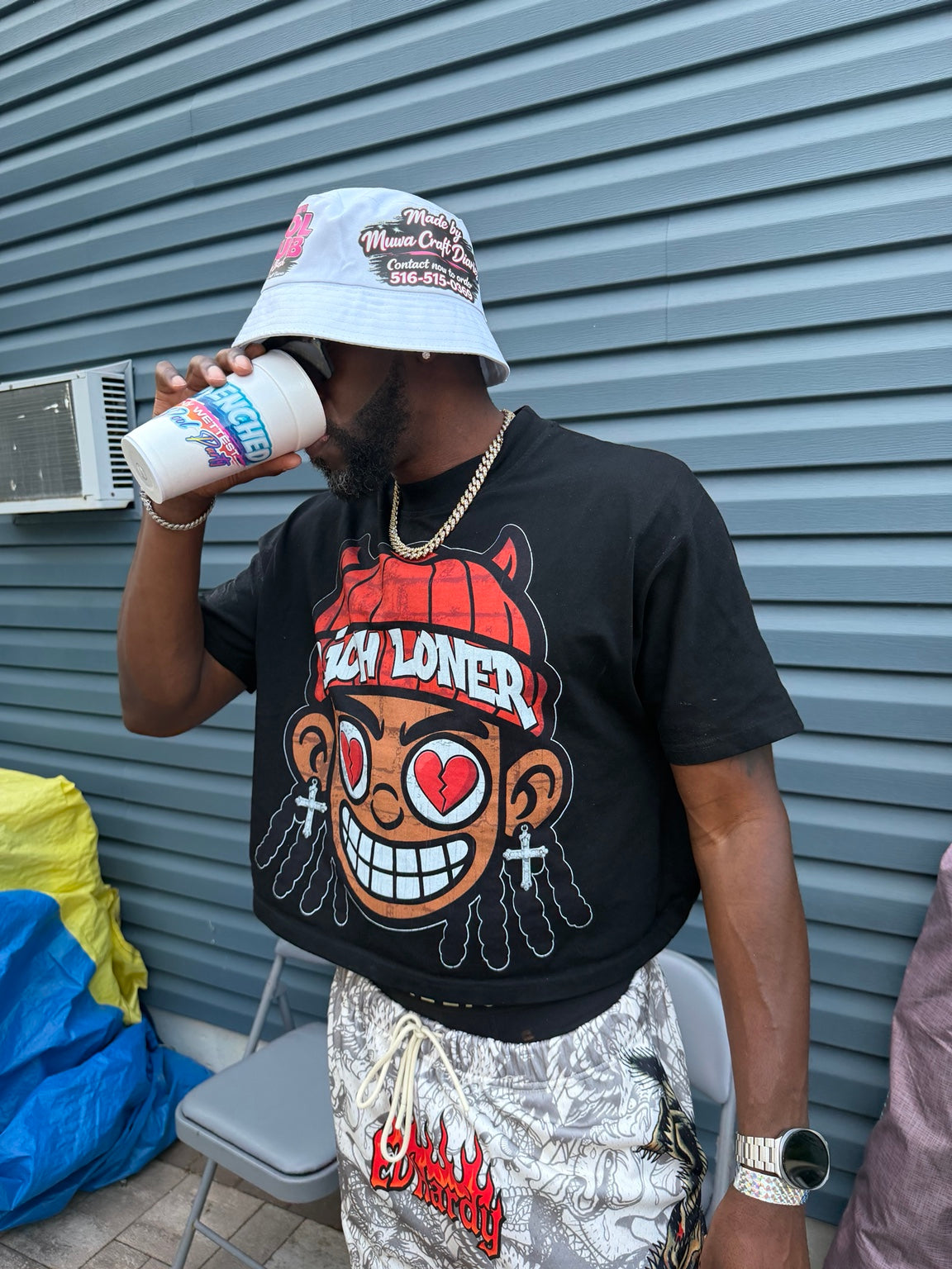 Guest wearing a custom white bucket hat made by Muva Craft Diaries